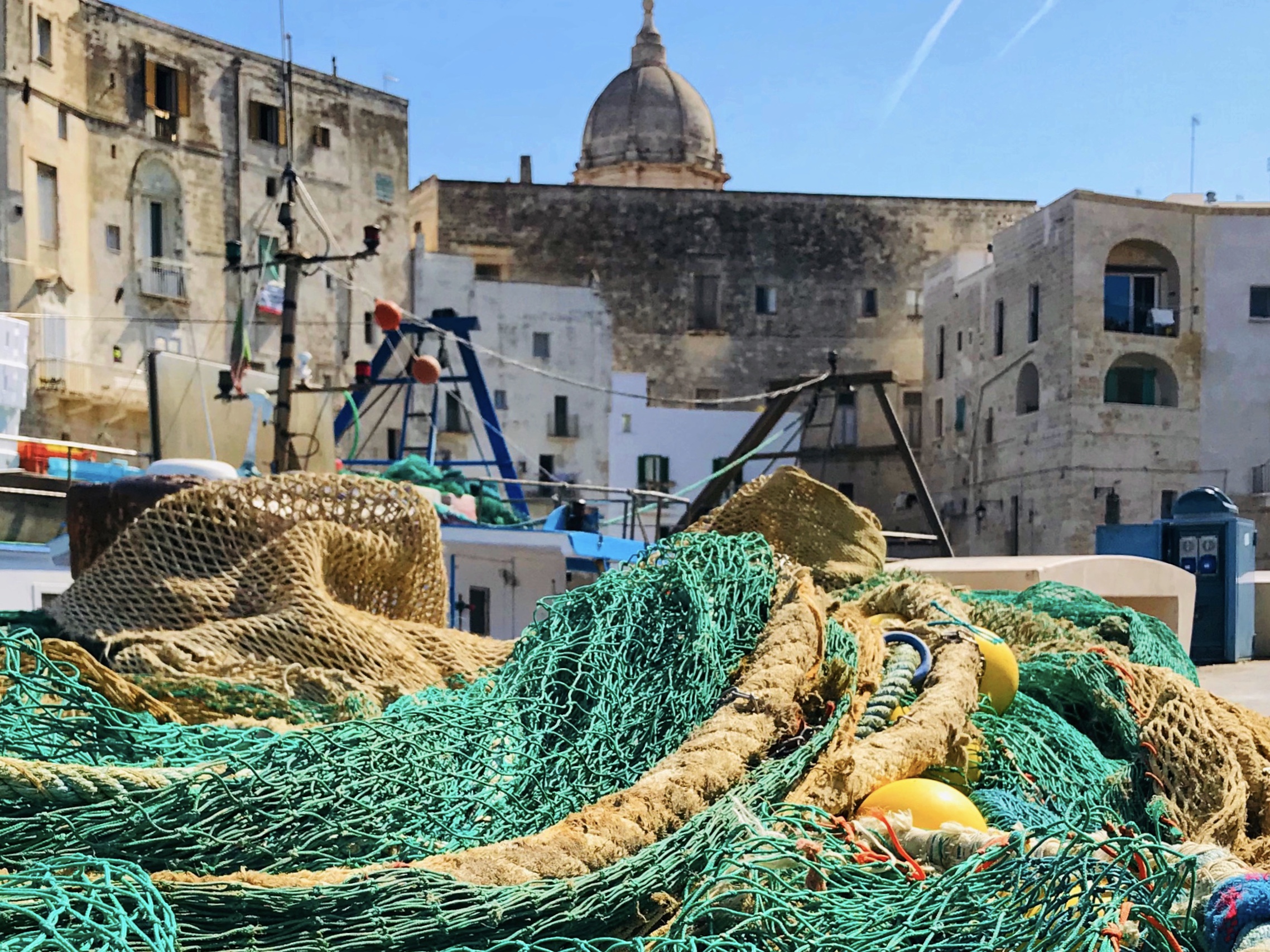 Fishing nets left to dry at the old port in Monopoli, Puglia.