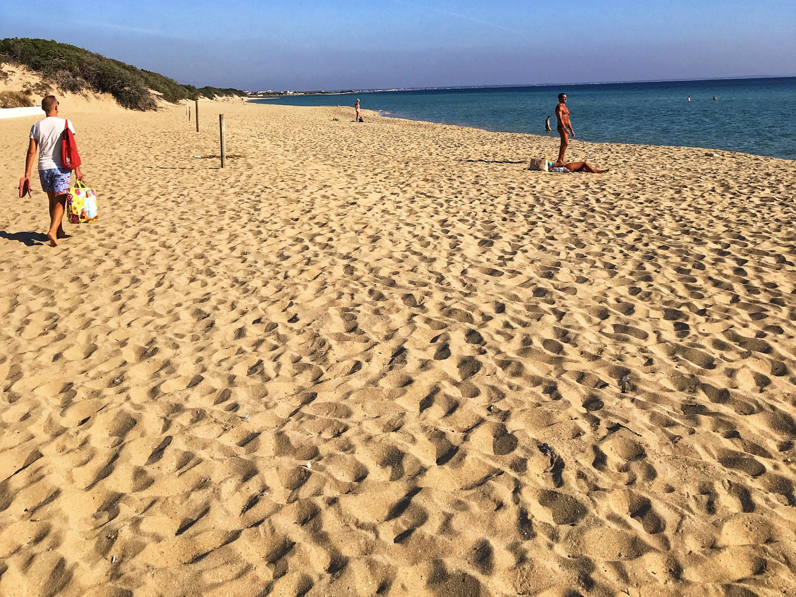 Punto Prosciutto is a long golden sandy beach in Puglia.