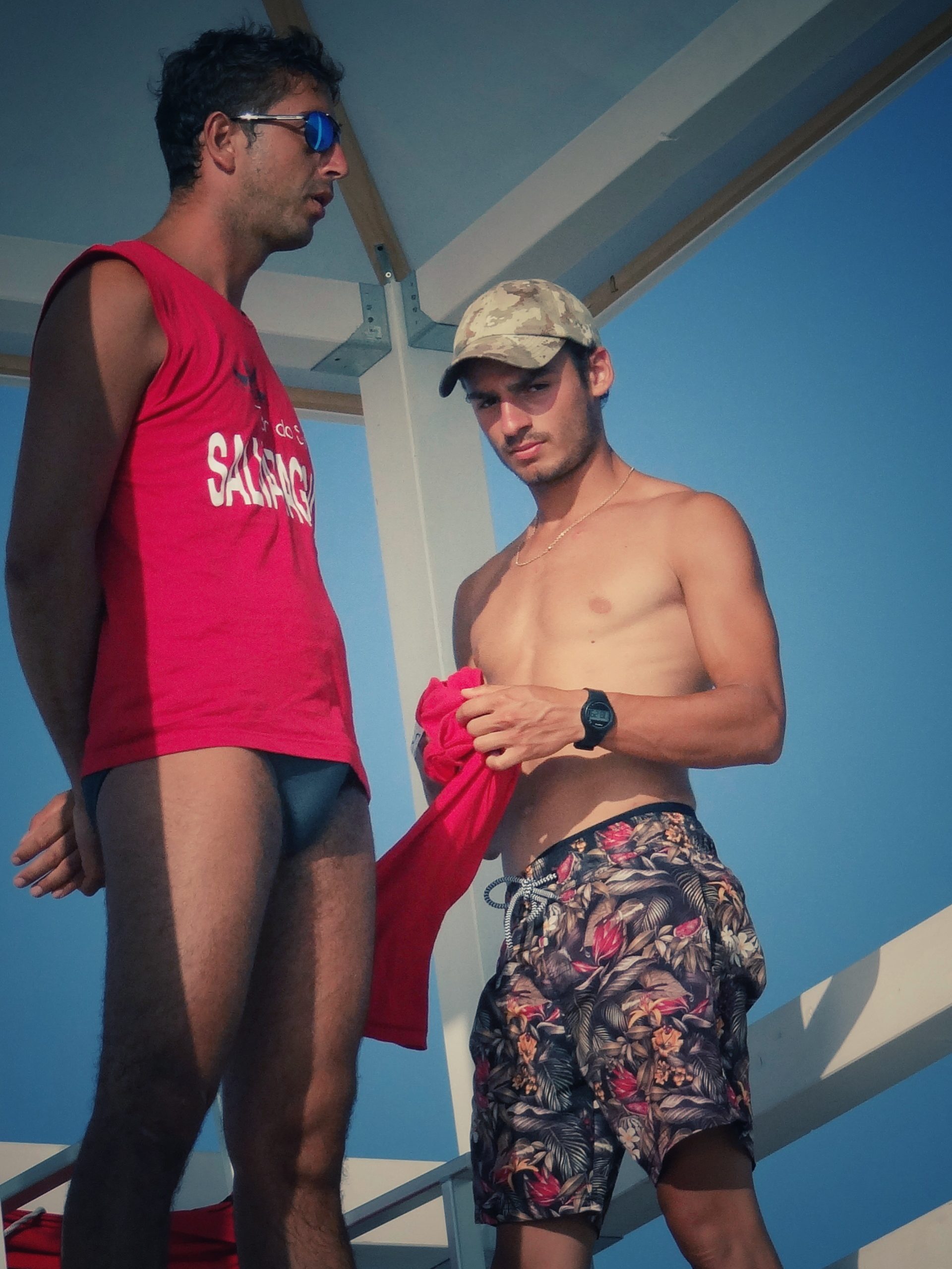 The lifeguards at Por do Sol, Gallipoli. Definitive gay Puglia Guide. Photo copyright ©️ the Puglia Guys | The Big Gay Puglia Guide by the Puglia Guys.