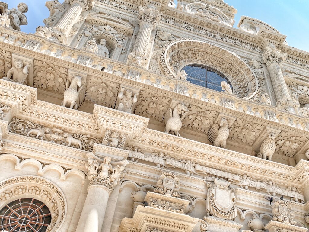 Lecce’s The Basilica di Santa Croce has one of the finest and most intricate Baroque facades in Italy, taking over 200 years to complete, its detail exquisite. Gay Puglia and gay Lecce guides brought to you by the Big Gay Podcast from Puglia.