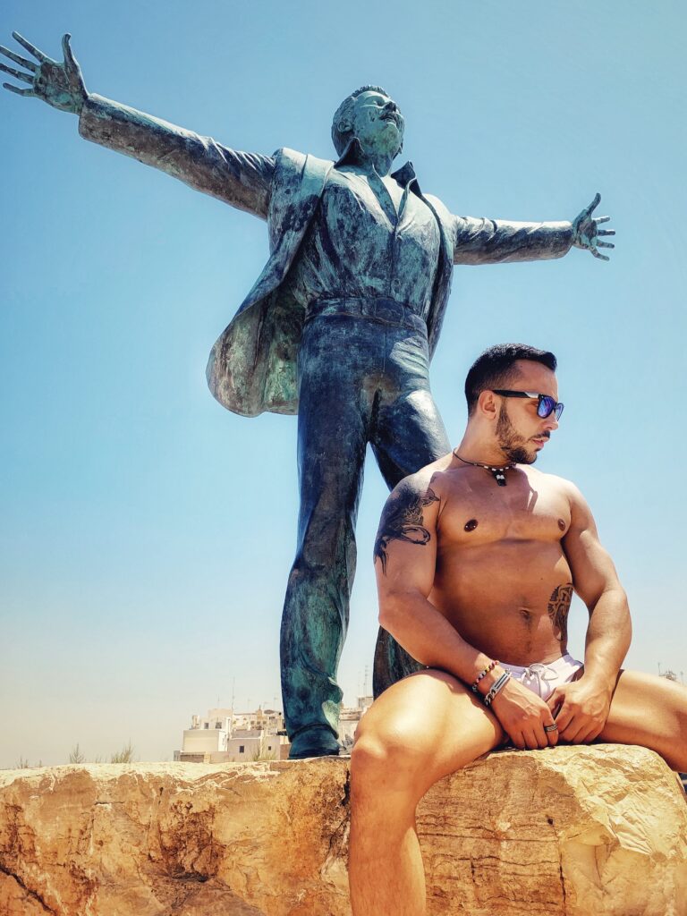 Domenico Modugno statue, Volare. Polignano a Mare, Puglia. Photo the Puglia Guys for the Big Gay Podcast from Puglia