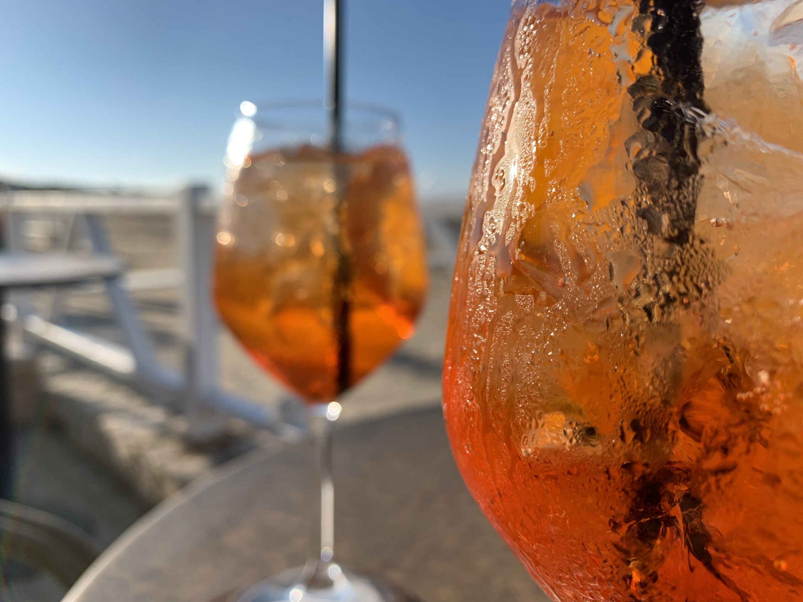 Aperol Spritz enjoyed on the beach at Vieste in Gargano a top Puglia destination for 2021. The Big Gay Podcast from Puglia gay guide to Puglia.