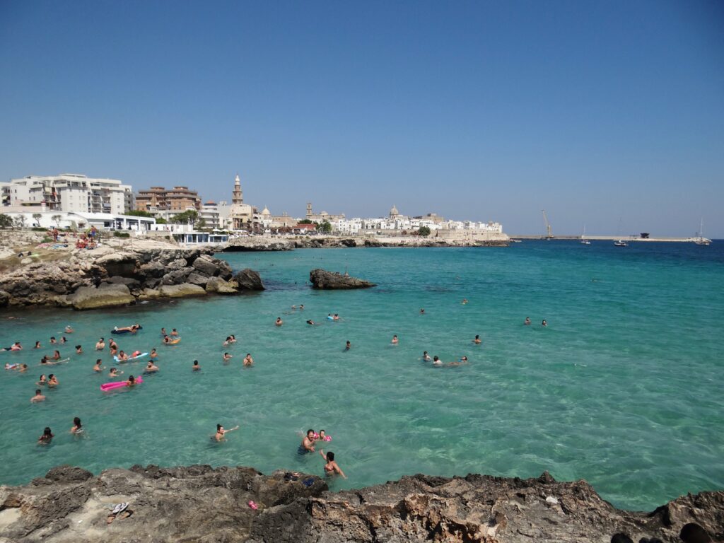 Porto Rosso, Monopoli, beach. Photo copyright © the Puglia Guys for the Big Gay Podcast from Puglia. Puglia city and beach guides.