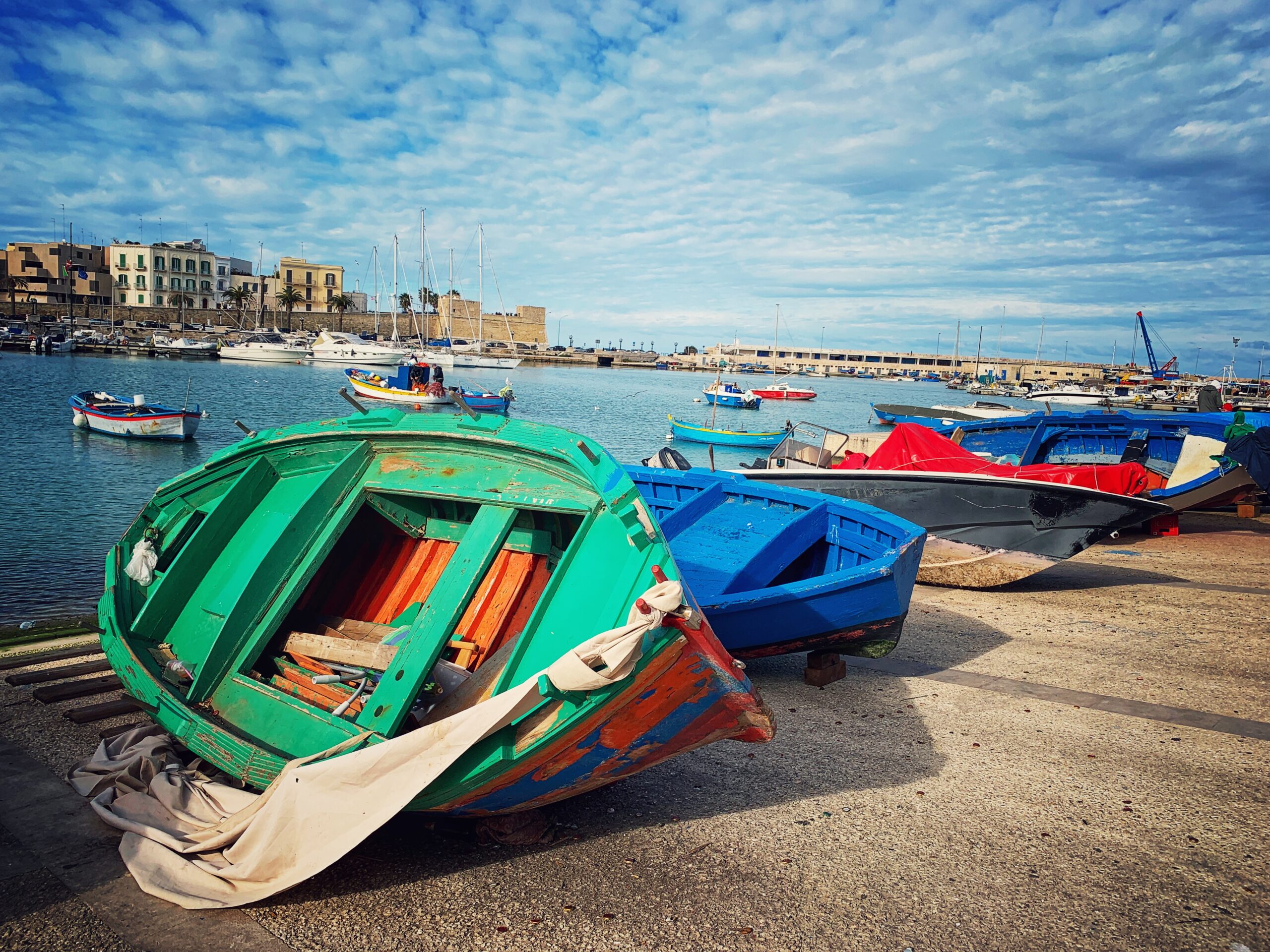 Typical blue “gozzi” fishing boats at Bari’s old port, porto vecchio.