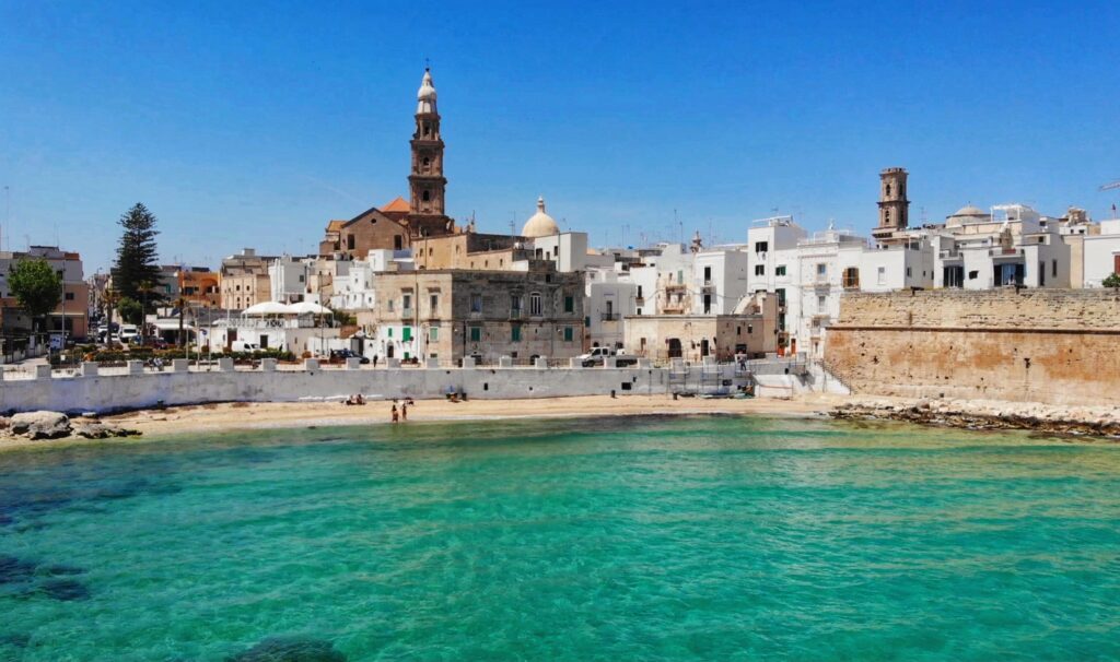 Spiaggia Cala Porta Vecchia, Monopoli town beach | Photo copyright © the Puglia Guys for the Big Gay Podcast from Puglia guides to Puglia, Italy’s top gay summer destination