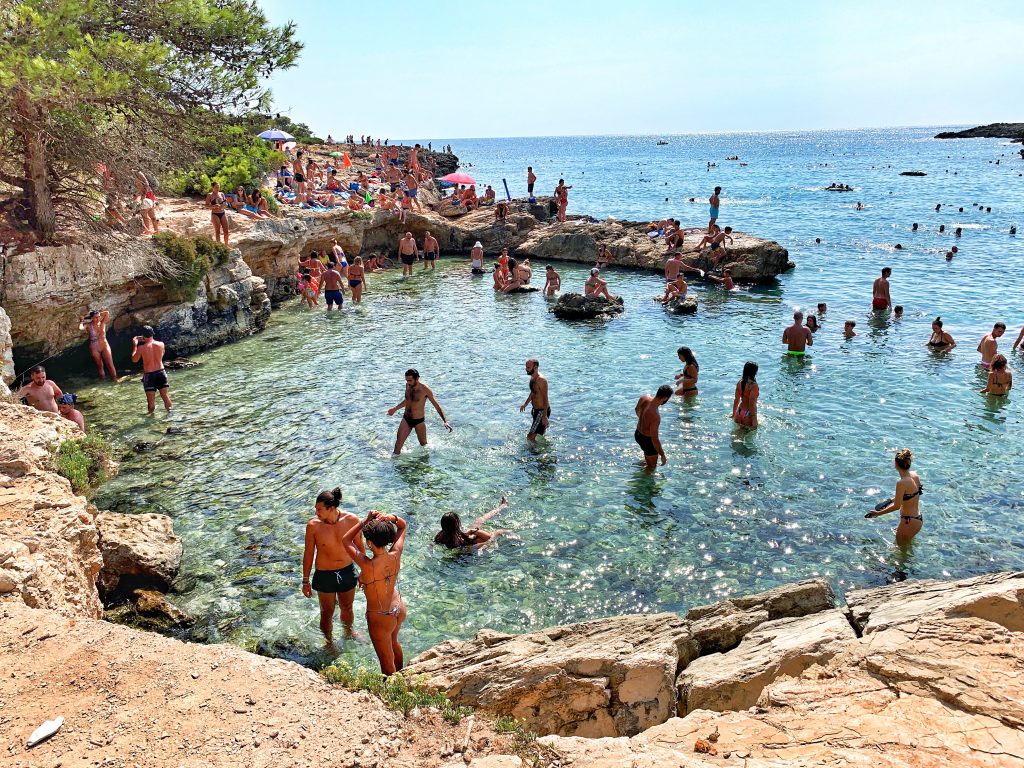 Porto Selvaggio, situated in a nature reserve, is a popular local beach with rocks | Photo © the Puglia Guys for the Big Gay Podcast from Puglia guides to gay Puglia, Italy’s top gay summer destination