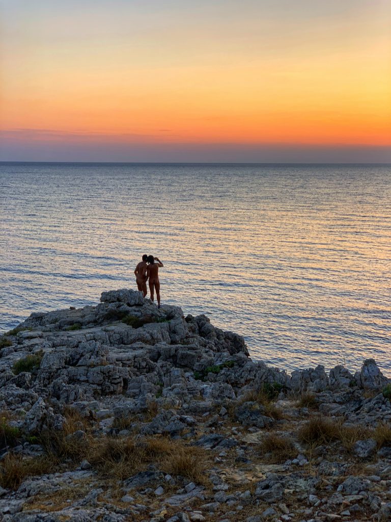 Porto Selvaggio gay beach, situated in a nature reserve, is a popular local beach with rocks | Photo © the Puglia Guys for the Big Gay Podcast from Puglia guides to gay Puglia, Italy’s top gay summer destination