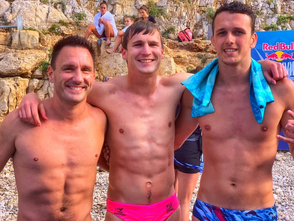 Blake Aldridge, Owen Weymouth and Aidan Heslop all represented the UK in the 2021 Red Bull Cliff Diving Series. The 2021 final at Polignano a Mare, Puglia. Photo the Puglia Guys for The Big Gay Podcast from Puglia.