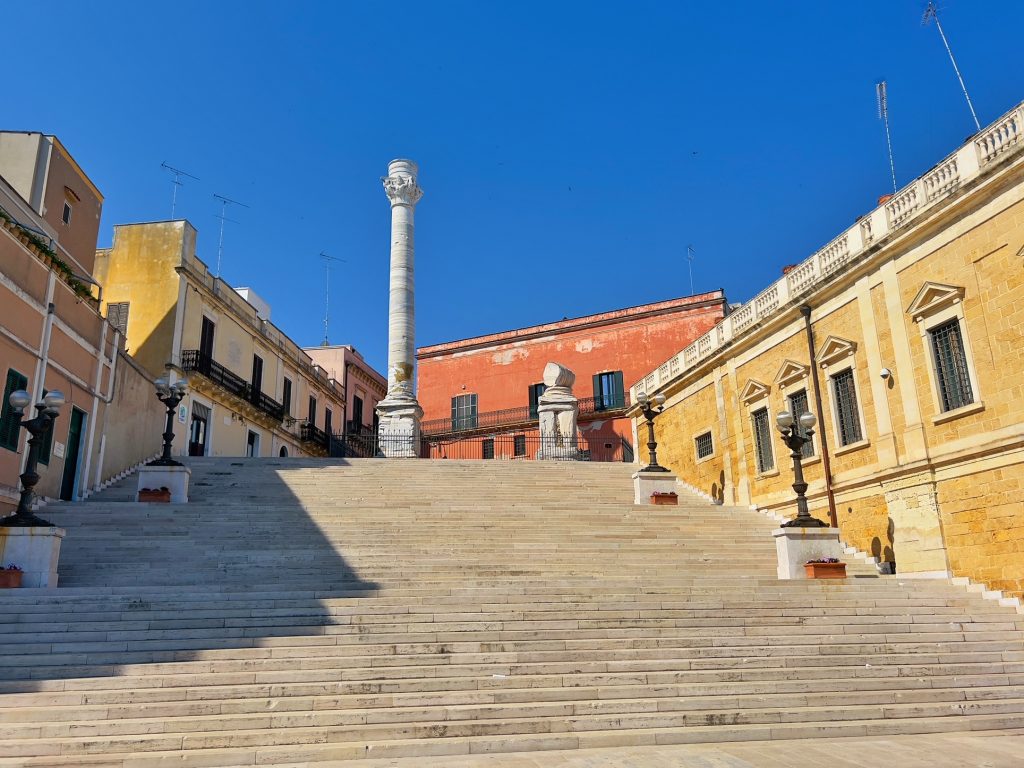 Le Colonne atop Virgil’s staircase Brindisi photo The Big Gay Podcast from Puglia, Brindisi city guide
