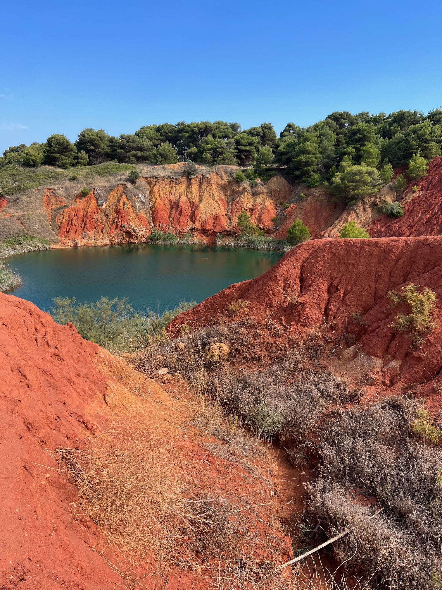 La cava di bauxite, Otranto’s bauxite quarry by the Big Gay Podcast from Puglia and the Puglia Guys | gay Puglia and gay Ostuni guide for Italy’s best gay beach and gay travel | Puglia, Italy, gay travel, gaycation