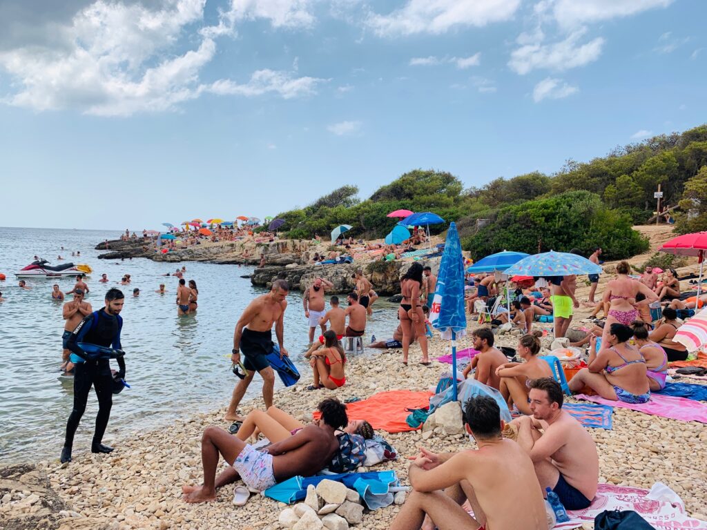 Porto Selvaggio, situated in a nature reserve, is a popular local beach with rocks | Photo © the Puglia Guys for the Big Gay Podcast from Puglia guides to gay Puglia, Italy’s top gay summer destination