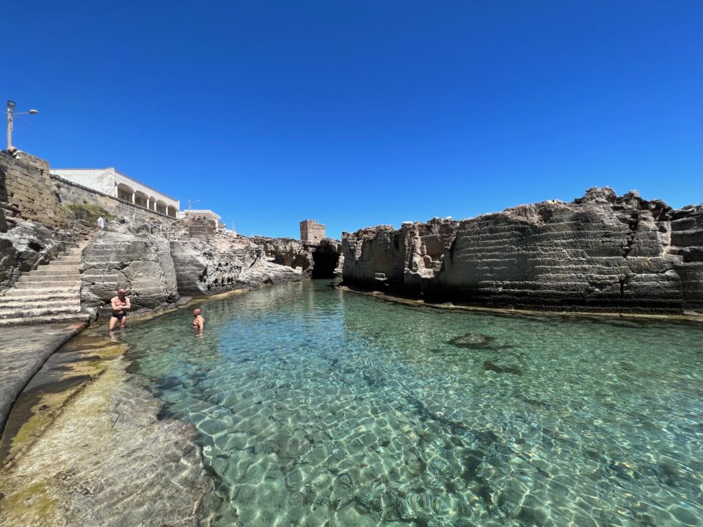 Marina Serra’s natural swimming basin | Photo © the Puglia Guys for the Big Gay Podcast from Puglia guides to gay Puglia, Italy’s top gay summer destination
