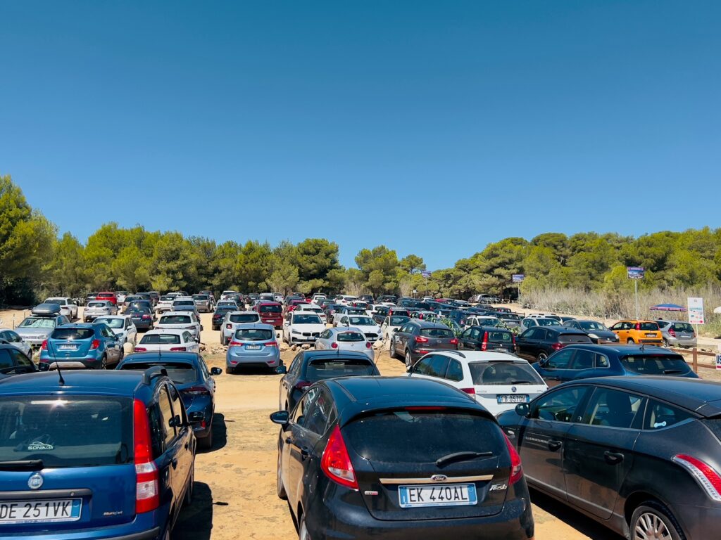 Punta della Suina car park, Gallipoli. One of Europe’s Top 40 beaches and voted Italy’s best gay and nudist beach | Photo © The Puglia Guys