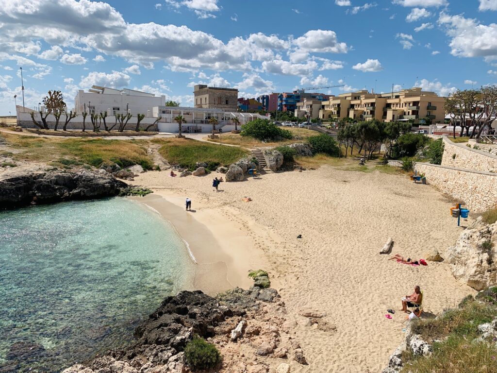 Porto Rosso, Monopoli, beach. Photo copyright © the Puglia Guys for the Big Gay Podcast from Puglia. Puglia city and beach guides.