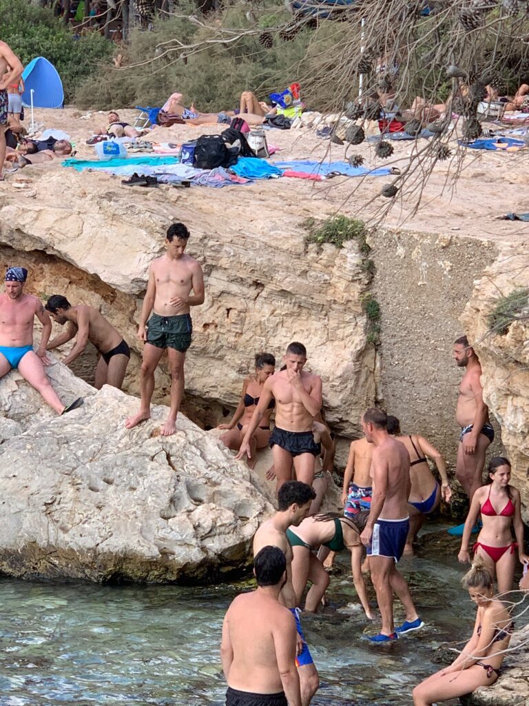Porto Selvaggio, situated in a nature reserve, is a popular local beach with rocks | Photo © the Puglia Guys for the Big Gay Podcast from Puglia guides to gay Puglia, Italy’s top gay summer destination
