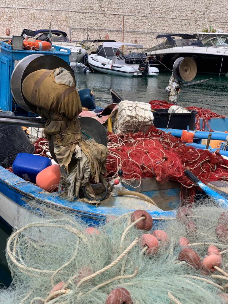 Fishermen dry their nets at Castro Marina, Castro | Photo © the Puglia Guys for the Big Gay Podcast from Puglia guides to gay Puglia, Italy’s top gay summer destination