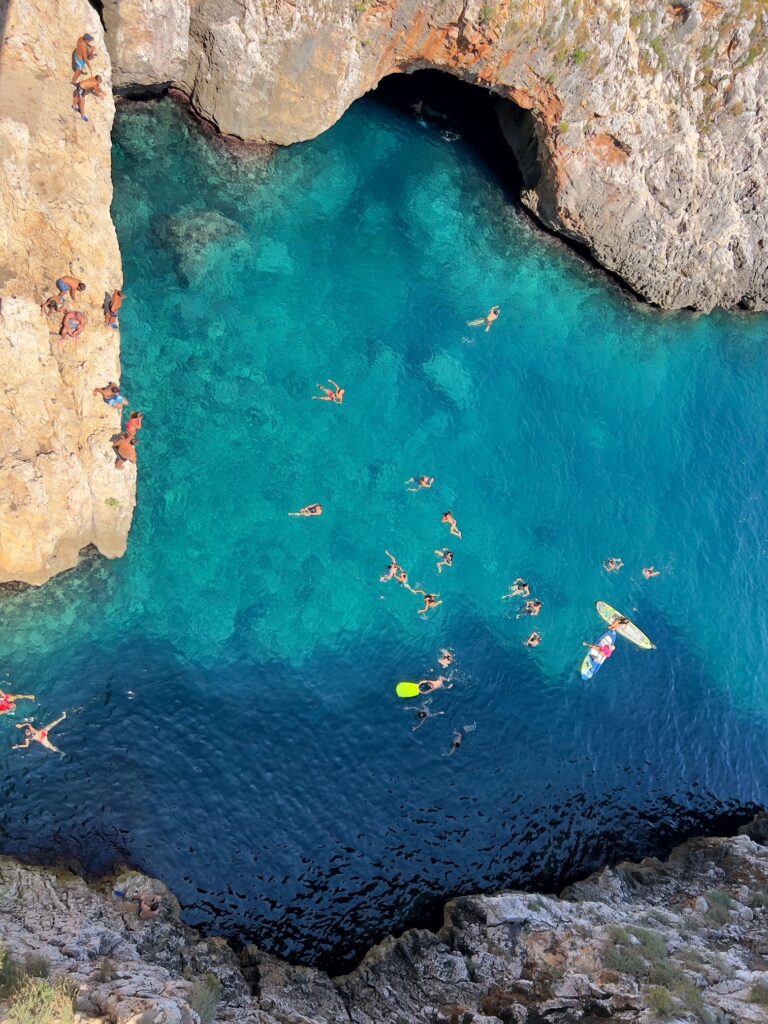 Il Ciolo, Gagliano del Capo - one of Puglia’s most beautiful swimming spots, in a dramatic canyon underneath a bridge | Photo © the Puglia Guys for the Big Gay Podcast from Puglia guides to gay Puglia, Italy’s top gay summer destination