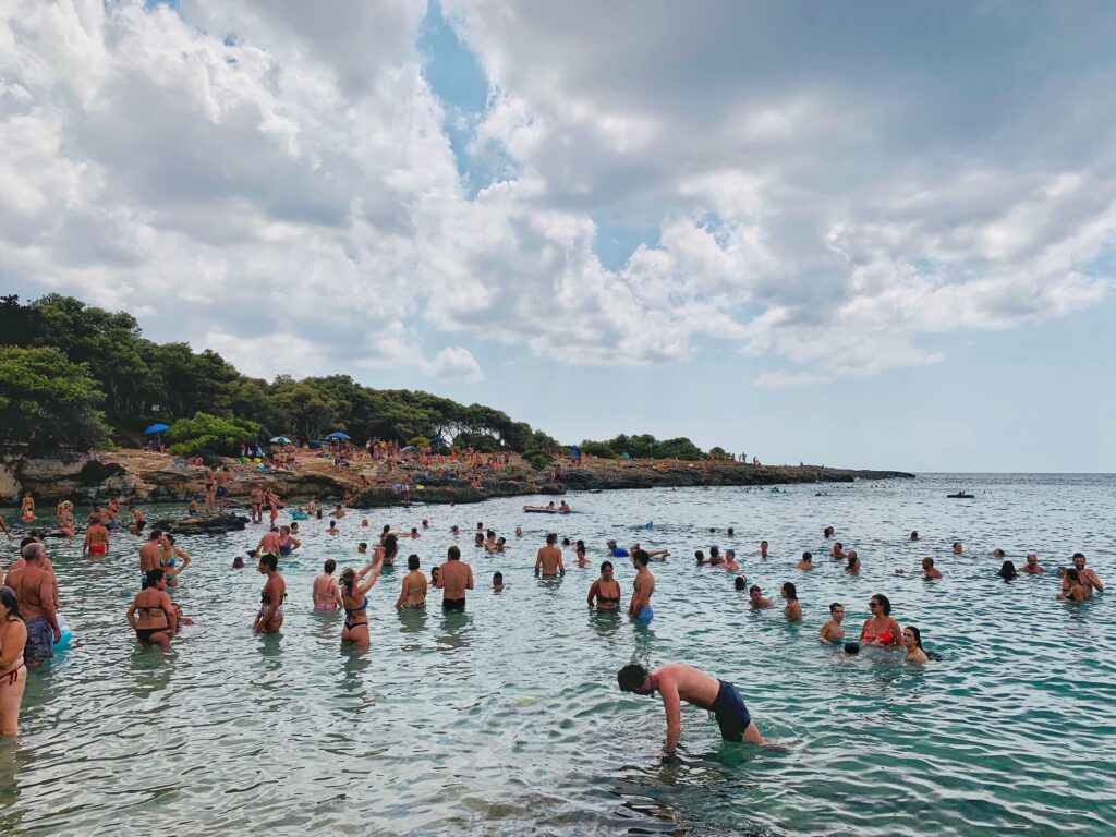 Porto Selvaggio, situated in a nature reserve, is a popular local beach with rocks | Photo © the Puglia Guys for the Big Gay Podcast from Puglia guides to gay Puglia, Italy’s top gay summer destination