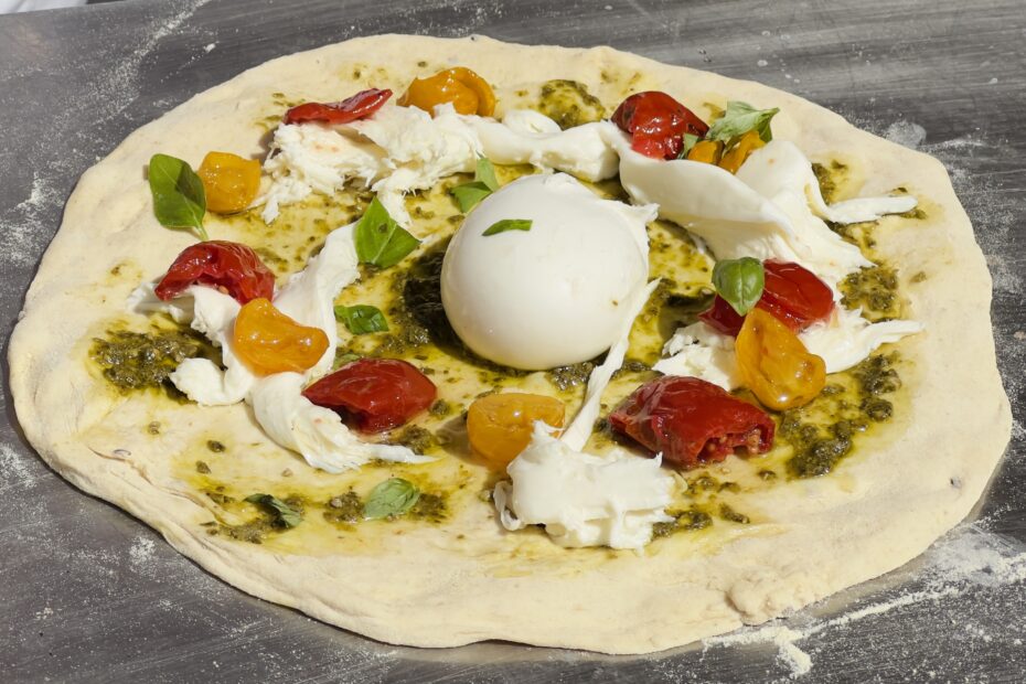 Pizza from Puglia with burrata | photo the Puglia Guys for the Big Gay Podcast from Puglia travel guides to Italy’s top gay summer destination for LGBTQ travel.