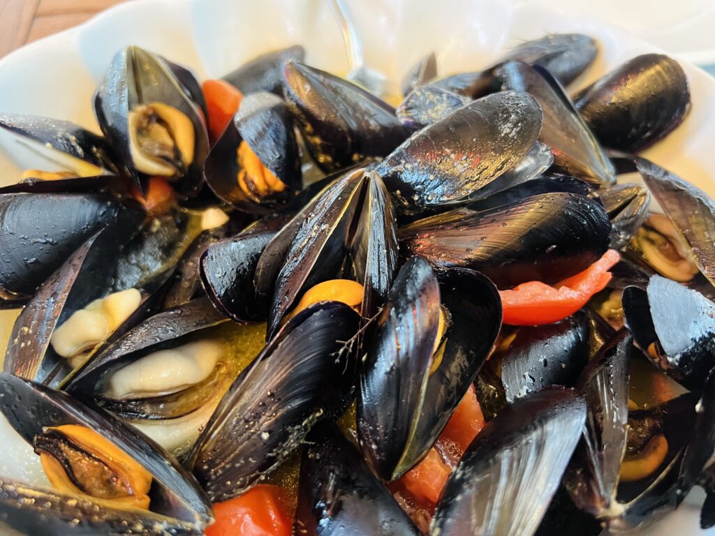Our love affair with Taranto’s old town started with cozze: mussels. La cozza tarantina is unlike any other we have tasted. Tarantina mussels benefit from the unique conditions of the bay in which they are cultivated. Oxygen rich underwater springs flush into an inner basin which already has a higher salinity. This favours and flavours the plankton, plumping up the mussels with their distinctive taste. Photo the Puglia Guys for the Big Gay Puglia Guide. Travel and city guides to the best of Puglia.