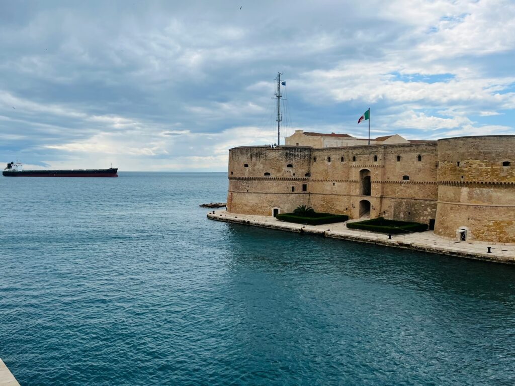Taranto’s Castello Aragonese. A medieval fortress built in the 15th century by the Aragonese, a powerful maritime kingdom that controlled much of southern Italy and Sicily at the time. Photo copyright the Puglia Guys for the Big Gay Guide to Puglia, travel and city guides to the best of Puglia.