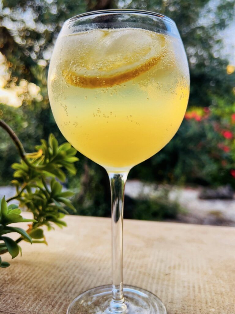 Limoncello spritz made from lemons from Puglia, a refreshing zingy summer alternative to aperol spritz. Photo and recipe by the Puglia Guys.
