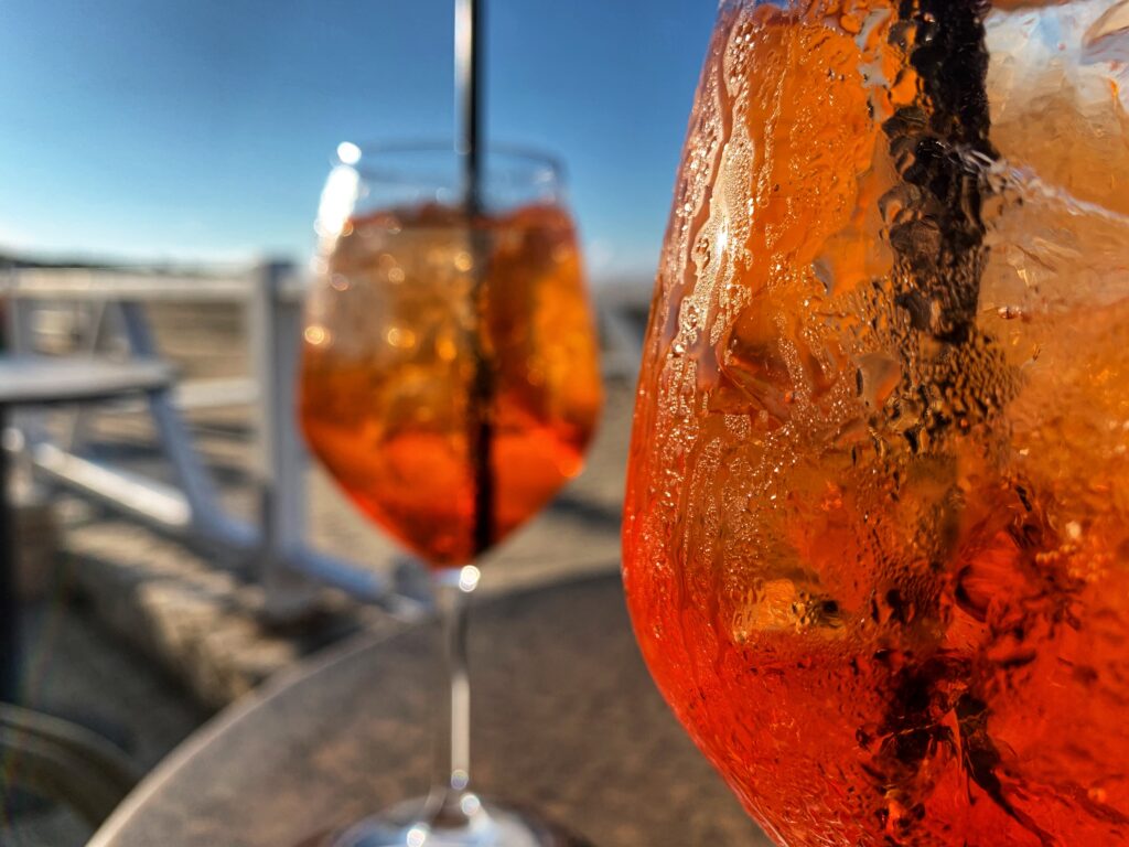 An aperol spritz in Vieste. Alternatively Limoncello spritz made from lemons from Puglia, a refreshing zingy summer alternative to aperol spritz. Photo and recipe by the Puglia Guys.