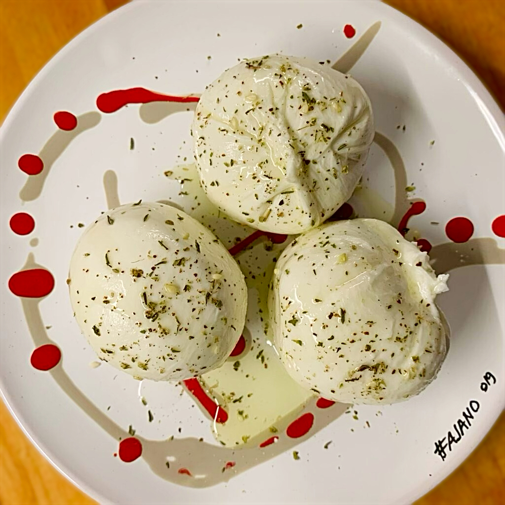 The joy of burrata, soft white cheese from Puglia | the Puglia Guys guides to Puglia’s best food and restaurants Photo © the Puglia Guys for the Big Gay Podcast from Puglia guides to gay Puglia, Italy’s top gay summer and destination. One of Italy’s best foodie destinations.